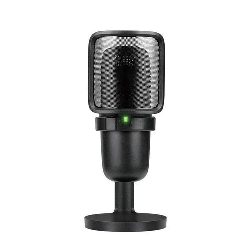 Black desktop microphone with mesh grille and green indicator light on white background