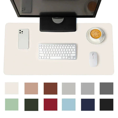 Minimalist office desk setup with monitor, keyboard, mouse, phone, coffee, and color options for desk mat.
